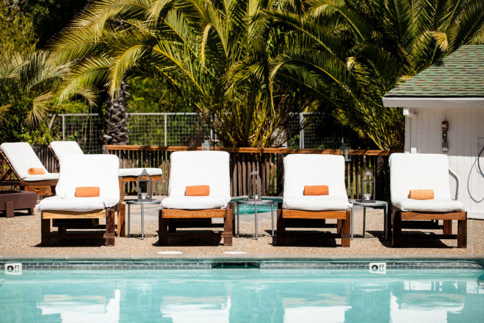 boon hotel + spa lounge chairs by pool